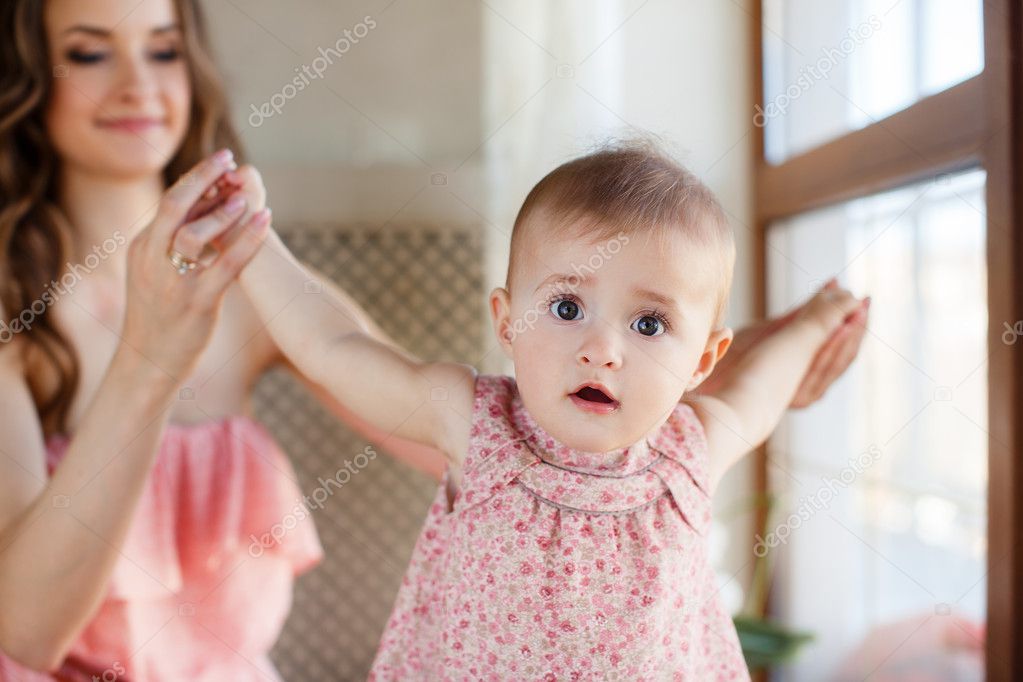 Mother and Baby playing and Laughing. Mom With her Child. Happy Family