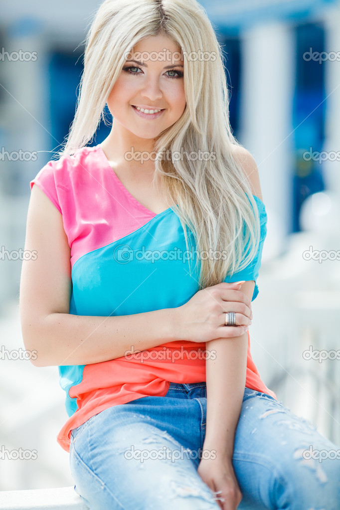 Portrait of a young smiling beautiful blonde