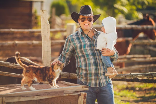 Portrait of young father playing with his little daughter in summer park, on countryside — Stock Photo, Image