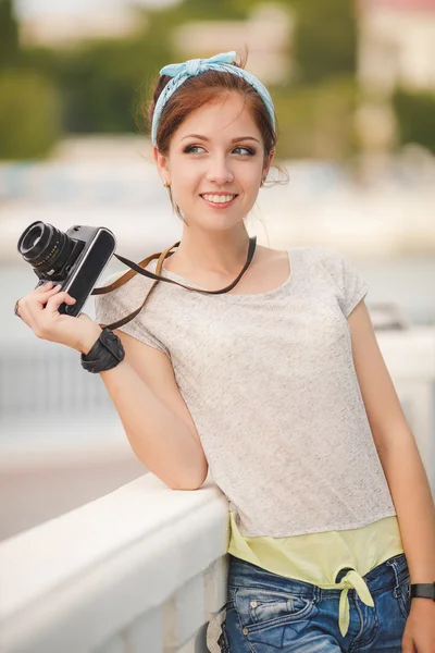 Young woman photographer portrait. Soft colors. — Stock Photo, Image