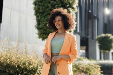 Smiling afro American woman portrait outdoors. High quality photo