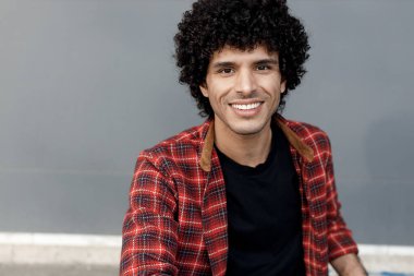 smiling handsome man in casual wear outdoor portrait . High quality photo