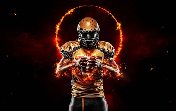 American football player black background with fire — Stock Photo, Image