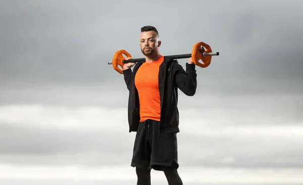 Bodybuilder Orange Sportswear Doing Squats Using Barbell Gym Train His — стоковое фото