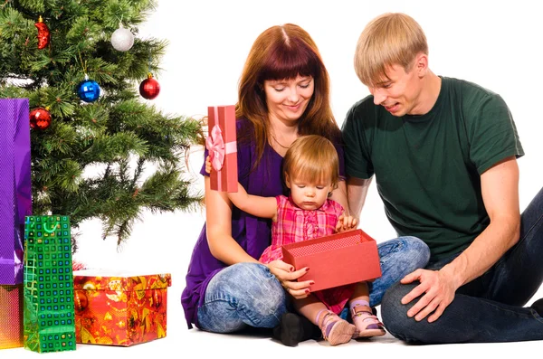 Baby near christmas tree — Stock Photo, Image