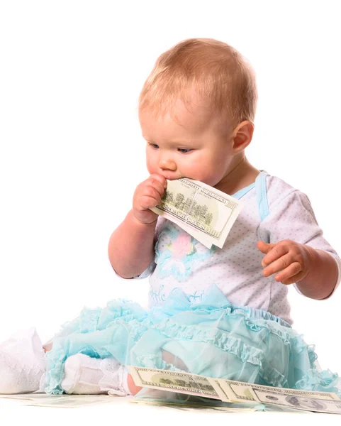 Baby is eating money — Stock Photo, Image
