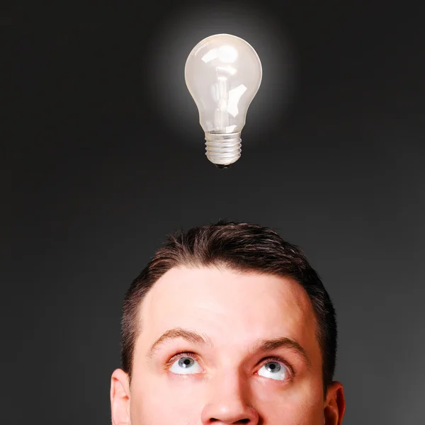 Male head with bulb — Stock Photo, Image