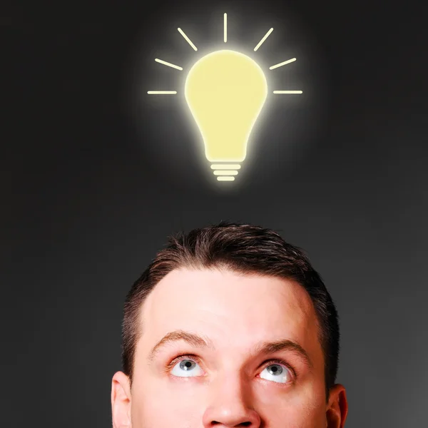 Male head with bulb — Stock Photo, Image