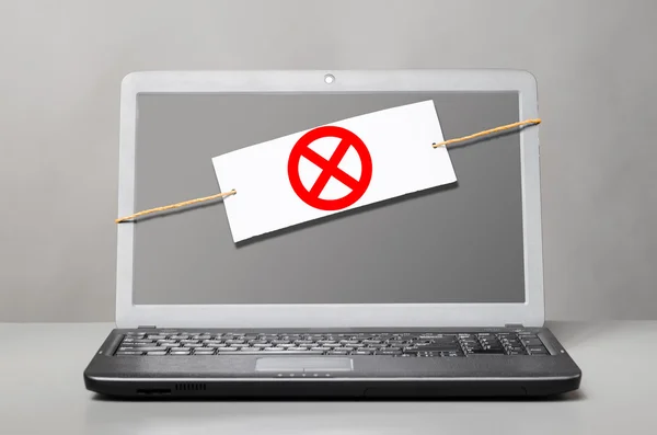 Laptop with deny sign — Stock Photo, Image