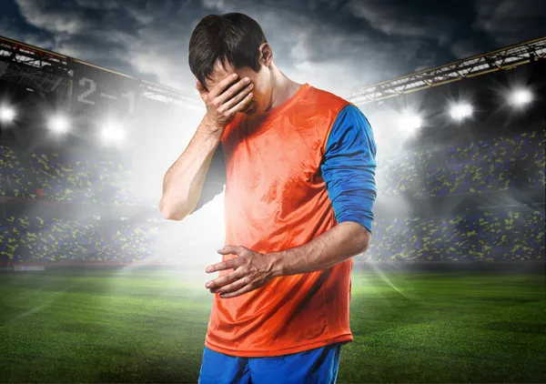 Sad soccer player — Stock Photo, Image