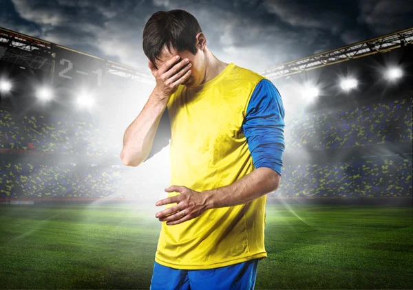 Triste jugador de fútbol — Foto de Stock