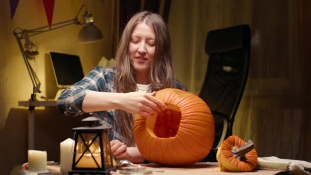 Preparing Pumpkin Halloween Woman Sitting Pulling Out Face Details Carved — Stockvideo
