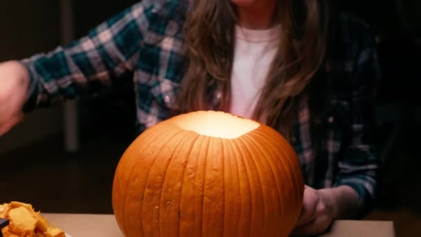 Illuminating Pumpkin Halloween Woman Sitting Lighting Showing Out Candle Lit — Stock video