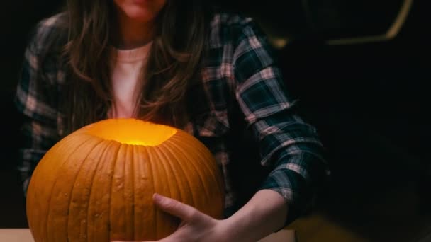 Illuminating Pumpkin Halloween Woman Sitting Lighting Showing Out Candle Lit — Stockvideo