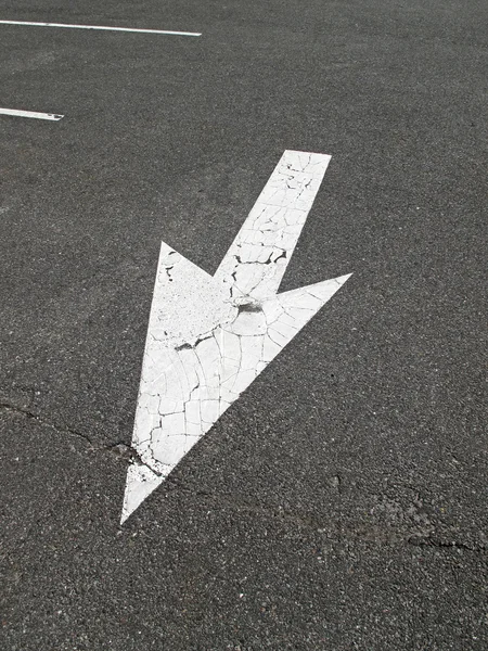 Flecha sobre un pavimento — Foto de Stock