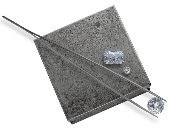 Diamonds and tweezers on a jeweler anvil — Stock Photo, Image