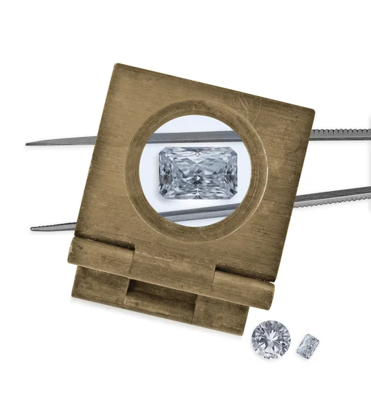 Vintage loupe over diamond and tweezers — Stock Photo, Image