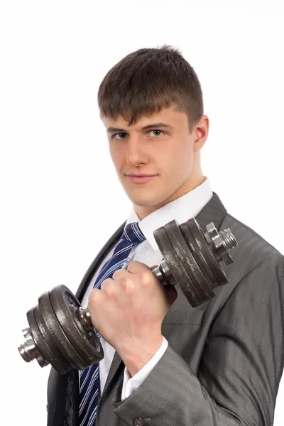 Young businessman with dumbbells — Stock Photo, Image