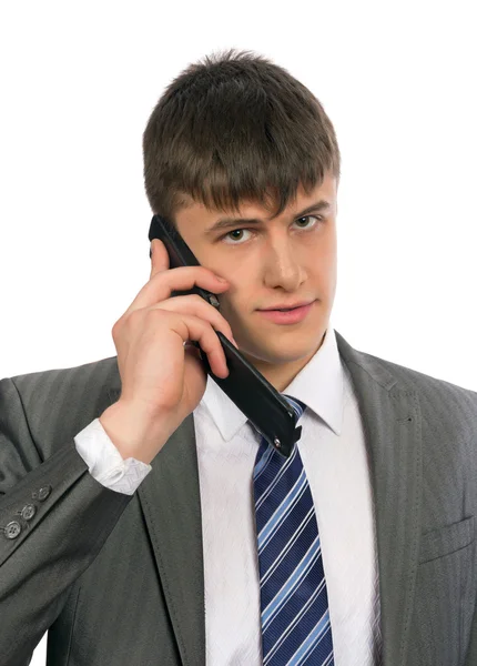 Ung affärsman talar på mobil — Stockfoto