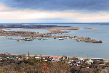 Saratov. View of island Zelenyy on Volga River. Russia clipart