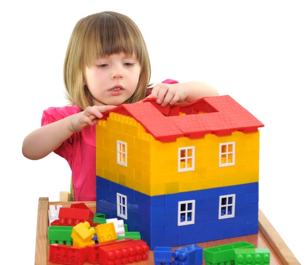 Girl playing with blocks Stock Photo