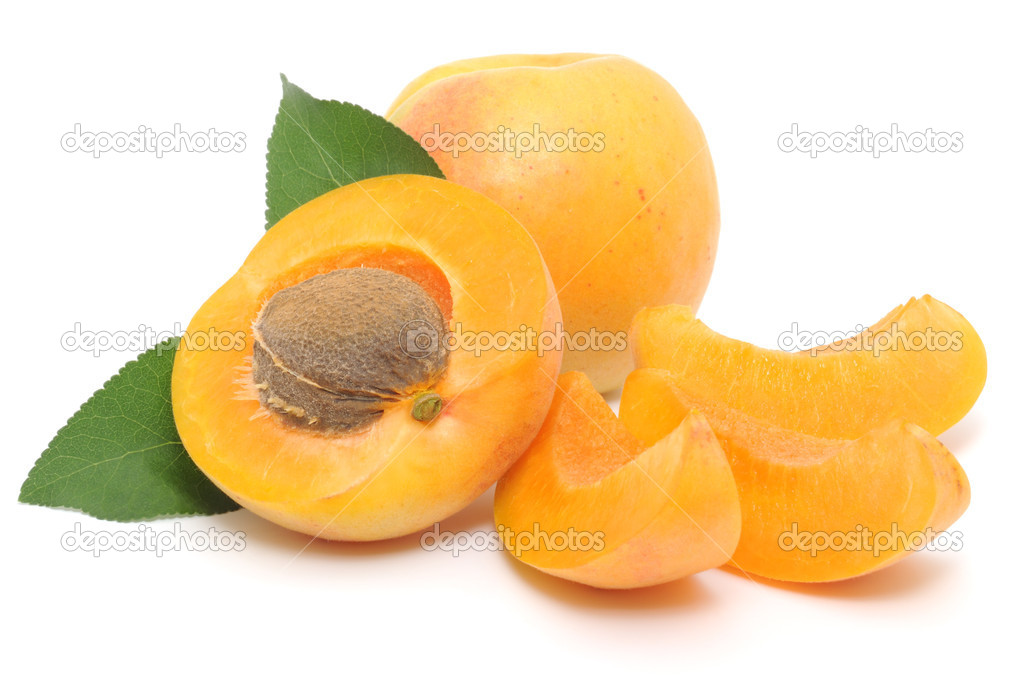 Apricots with leaves.