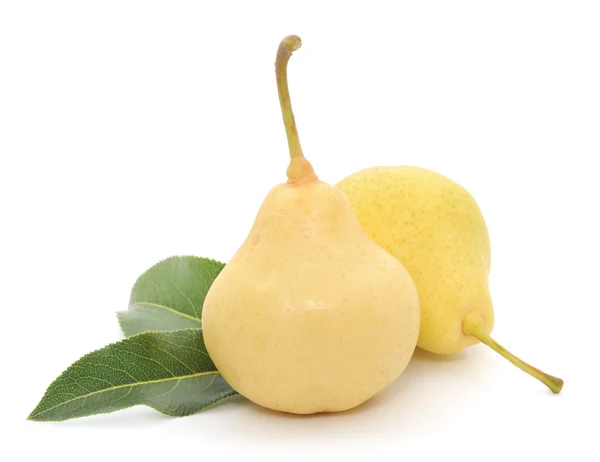 Yellow pears with green leafs — Stock Photo, Image