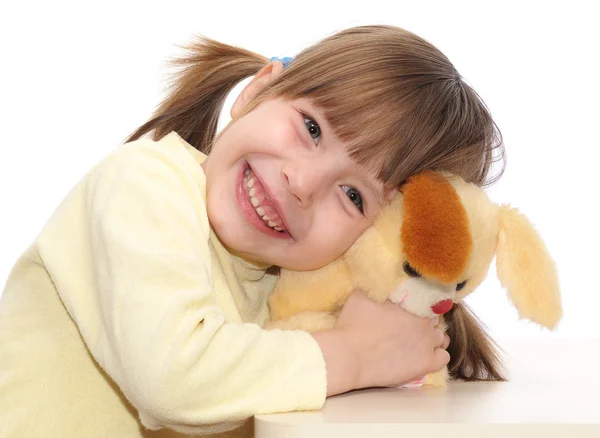 Smiling baby playing with toy — Stock Photo, Image