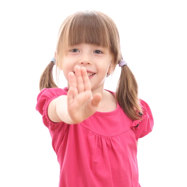 Sonriente niña mostrando su mano hacia arriba —  Fotos de Stock