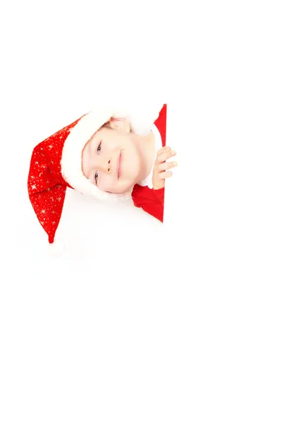 Pojke jultomten Stockbild