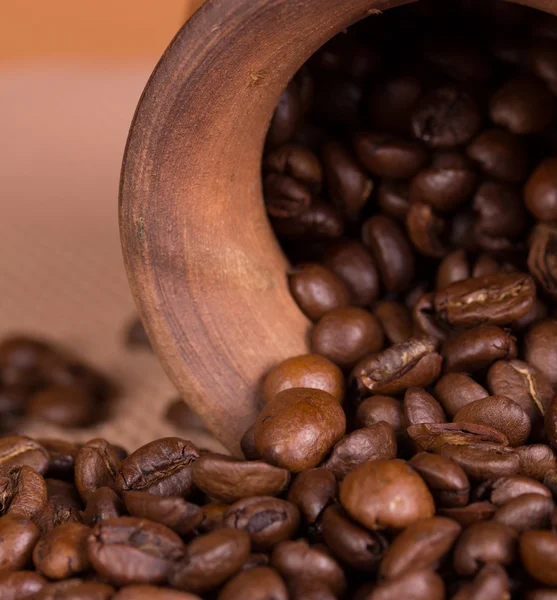 Ceramic jug with coffee beans — Stock Photo, Image