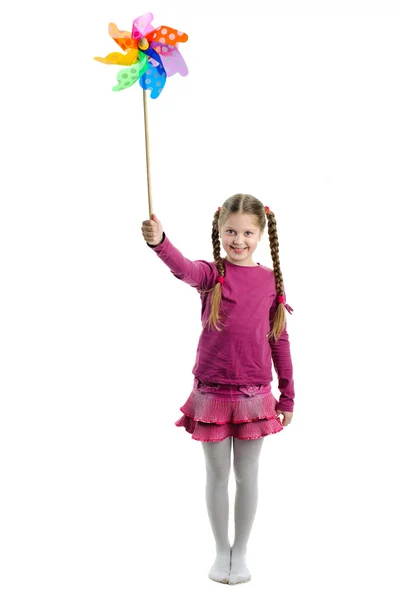 Girl with wind toy — Stock Photo, Image