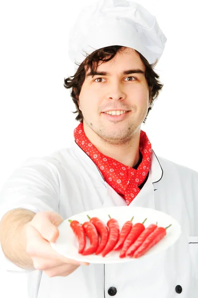 Cook with red peppers — Stock Photo, Image