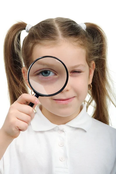 Girl with magnifying glass — Stock Photo, Image