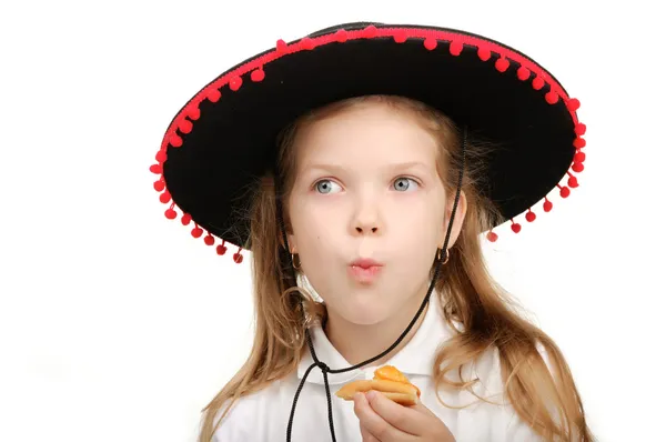 Girl cowboy eats hot dog. — Stock Photo, Image