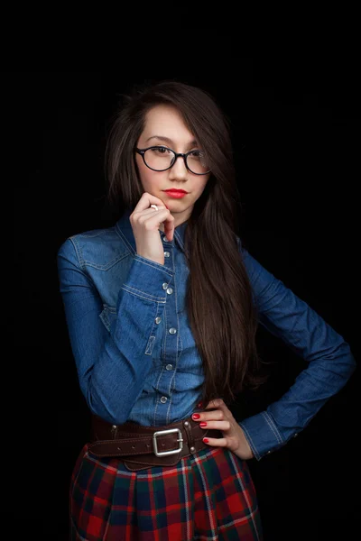 Young woman on a dark background — Stock Photo, Image