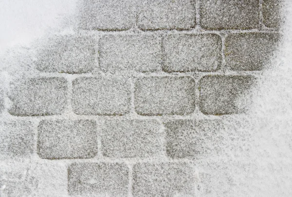 Diamond-shaped tile covered with snow — Stock Photo, Image