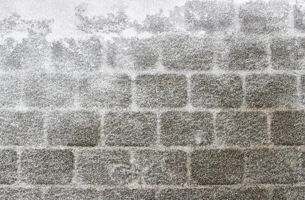 Gray wall covered with snow — Stock Photo, Image