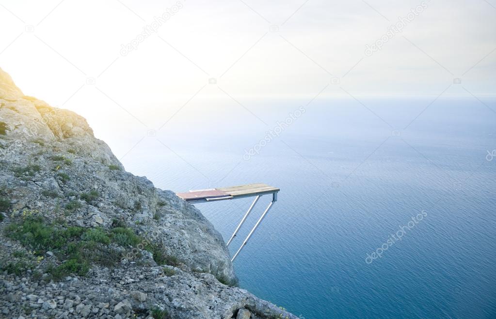Cliff Into Blue Water