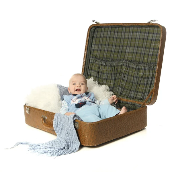 Baby yawning in a suitcase — Stock Photo © sjhuls 11623375