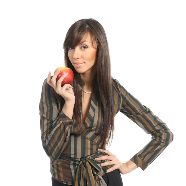 Красивая брюнетка-бизнесвумен держит яблоко — стоковое фото
