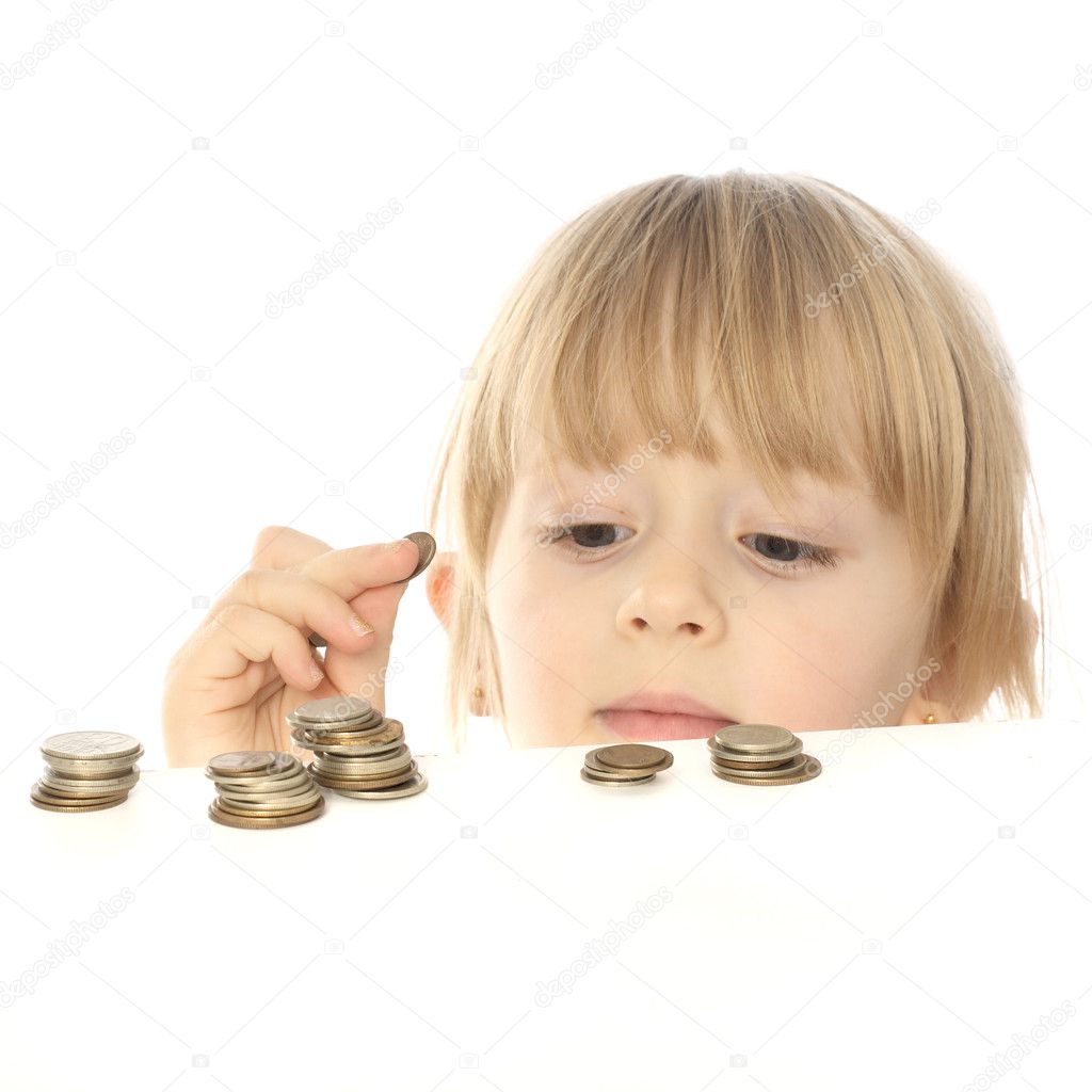 Sweet girl and columns of coins