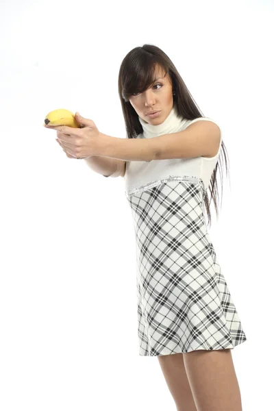 Young woman in dress with bananas — Stock Photo, Image