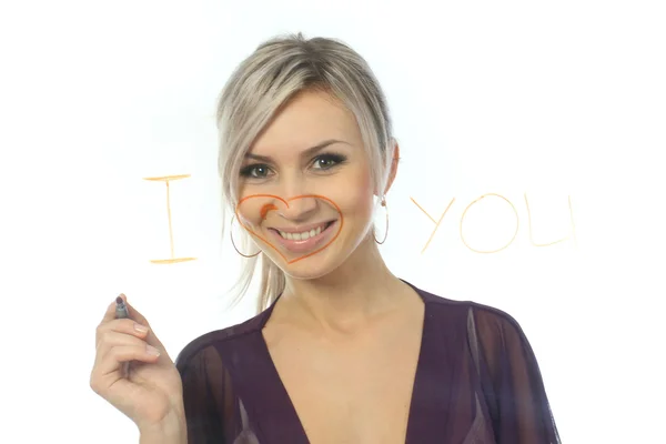 Blond girl writing Inscription lipstick. On a white background. — Stock Photo, Image