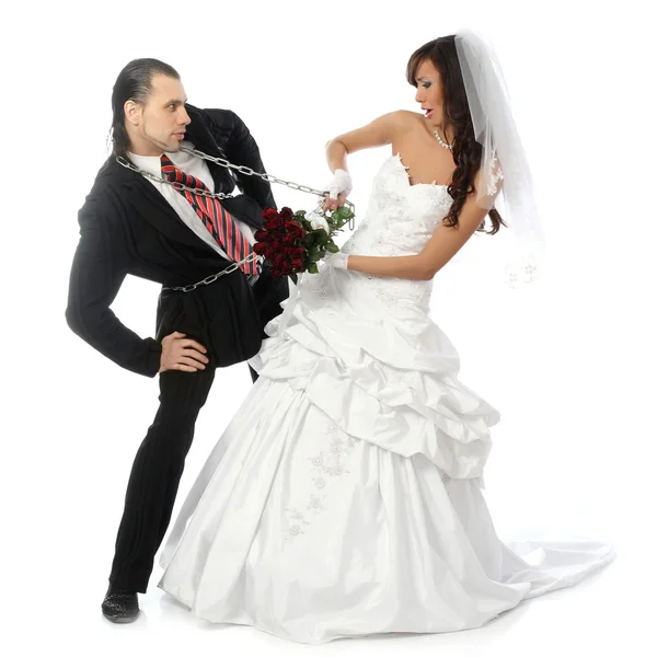 The bride and groom are tied with chain — Stock Photo, Image