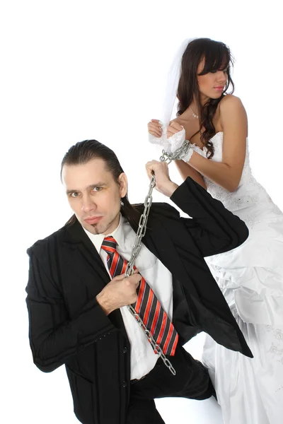 Pulls on the chain the bride — Stock Photo, Image