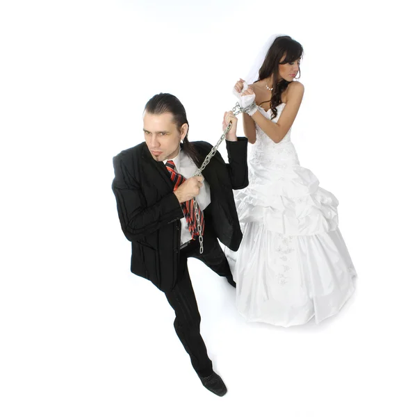 Pulls on the chain the bride — Stock Photo, Image