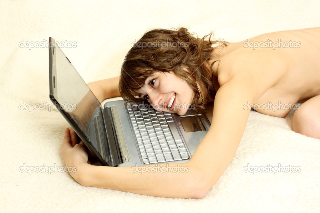 Positive girl indulges with a laptop