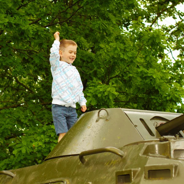 Boy on tank — Stock Photo, Image