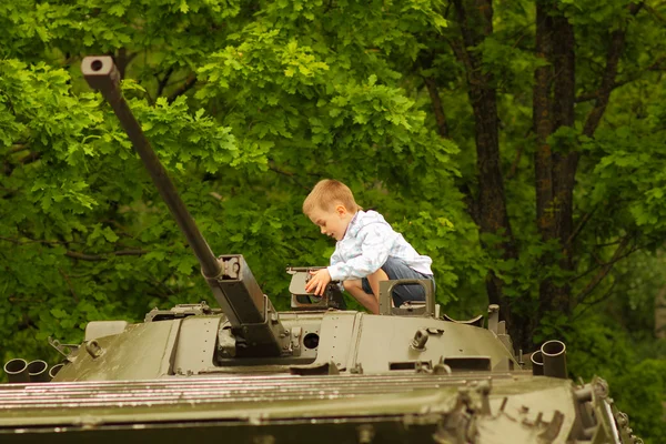 Boy on tank — Stock Photo, Image